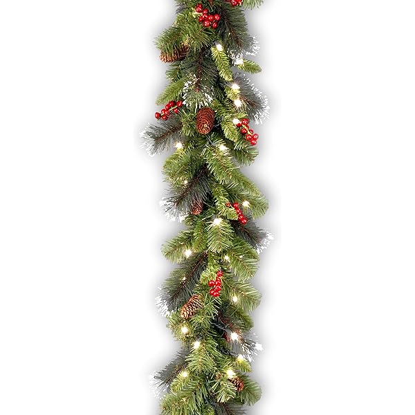 National Tree Company 9 ft Pre-Lit Crestwood Spruce Artificial Christmas Garland, Christmas Decoration with Glitter, Pinecones, Red Berries, 50 Clear Lights, 180 Tips, Green